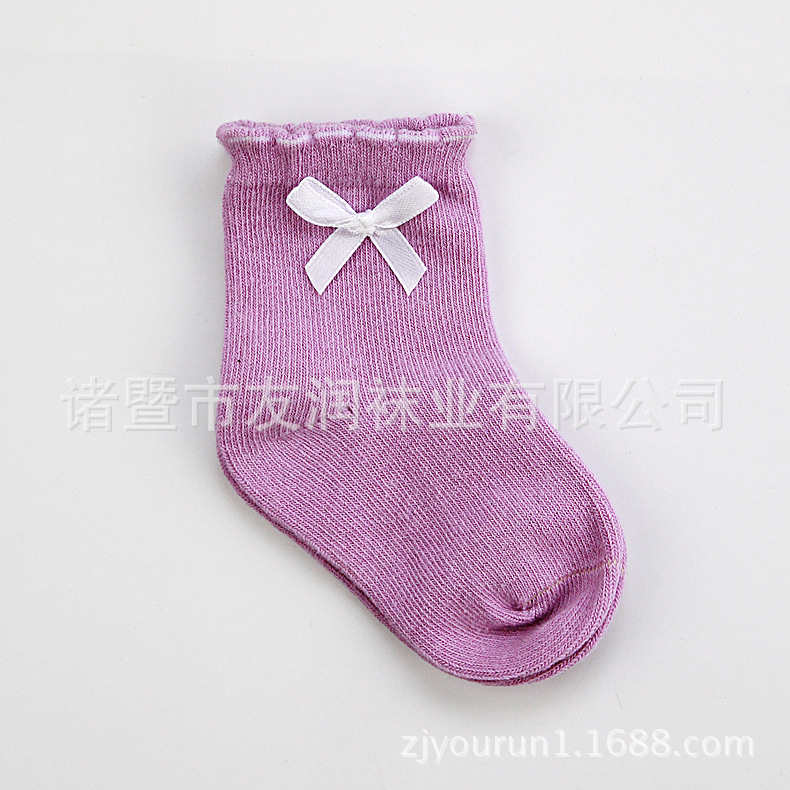 Calcetines para niños algodón peinado cabeza de costura sin hueso calcetines de bebé exquisito arco color sólido niña bebé holgado