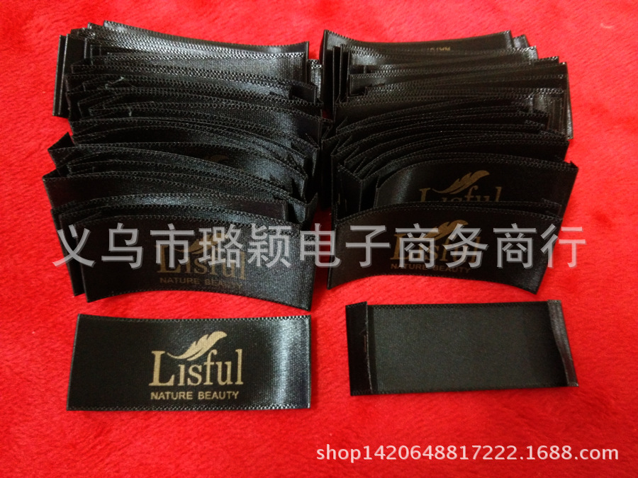 黑缎织边带印金色