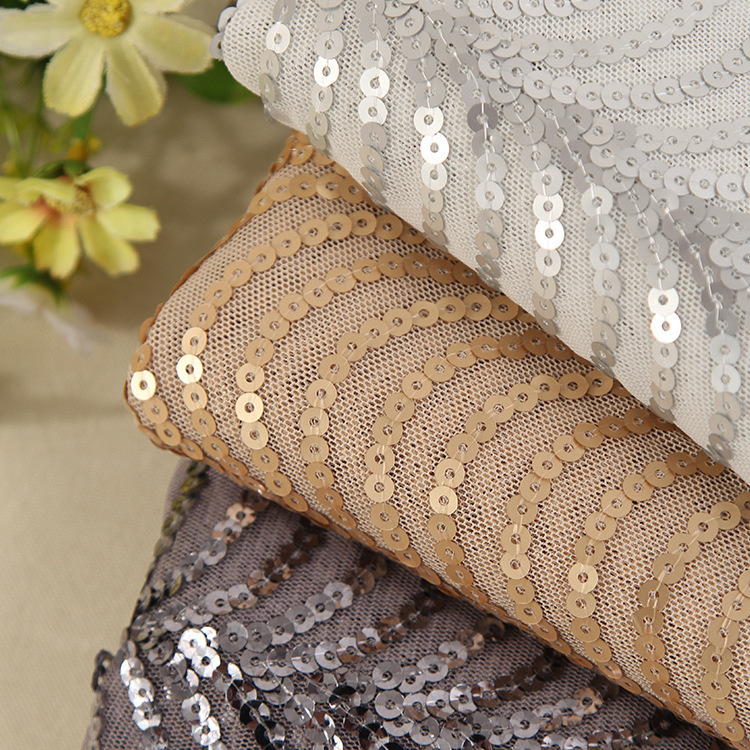 厂家直销全涤亮片绣 春夏时装婚纱礼服面料现货供应
