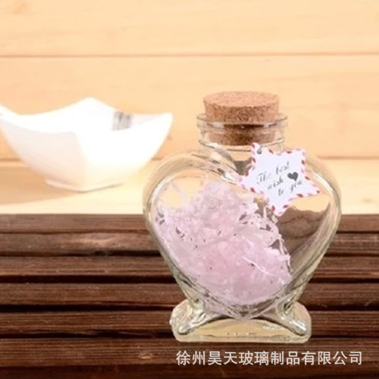 Los fabricantes suministran Linda botella de caramelo en forma de corazón botella de vidrio de corcho botella de Caramelo Suave