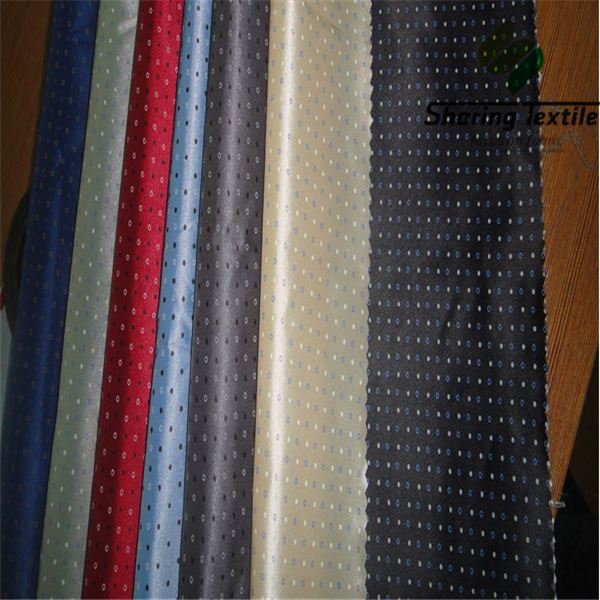 常年供应涤粘高档印花里布，人造丝印花里布，西装人丝印花里料