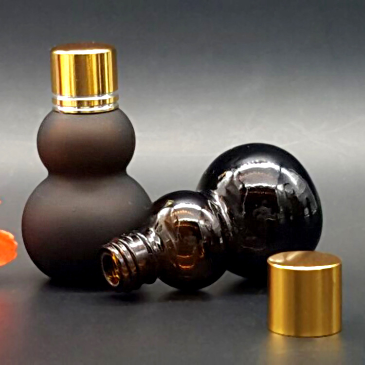 厂家供应化妆品玻璃瓶精油瓶茶双葫芦瓶小瓶子现货批发茶色玻璃瓶