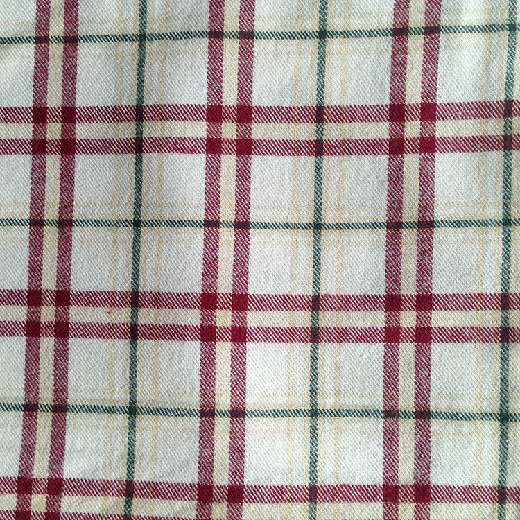 供应法兰绒色织布 100%涤纶色织绒布 加厚衬衫格子绒布面料