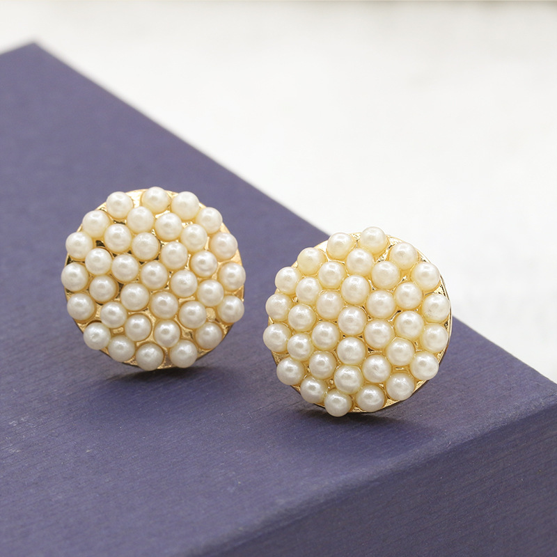 Simple Geometric Round Pearl Stud Earrings Millet Ball Ball Stud Earrings display picture 9