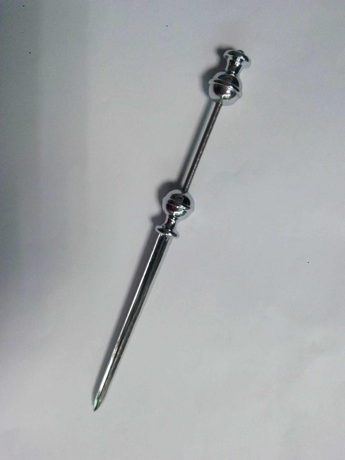 Metal opening a knife with beads