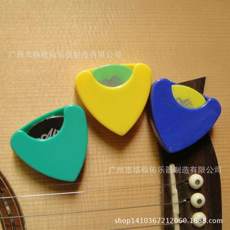 Large triangular pick clip, reinforced plastic, holds ordinary picks up to ~5 mm, high capacity