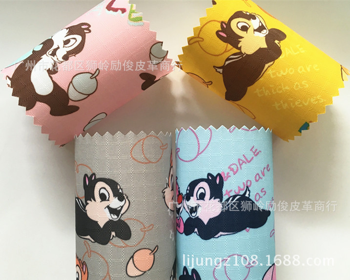 210D印花五分格PVC卡通松鼠大作战牛津布 防过水奇奇和蒂蒂箱包布