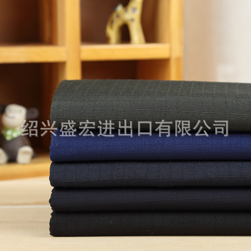 厂家直销 橄榄涤棉方格布  工装面料 训练服  战训服    制服面料