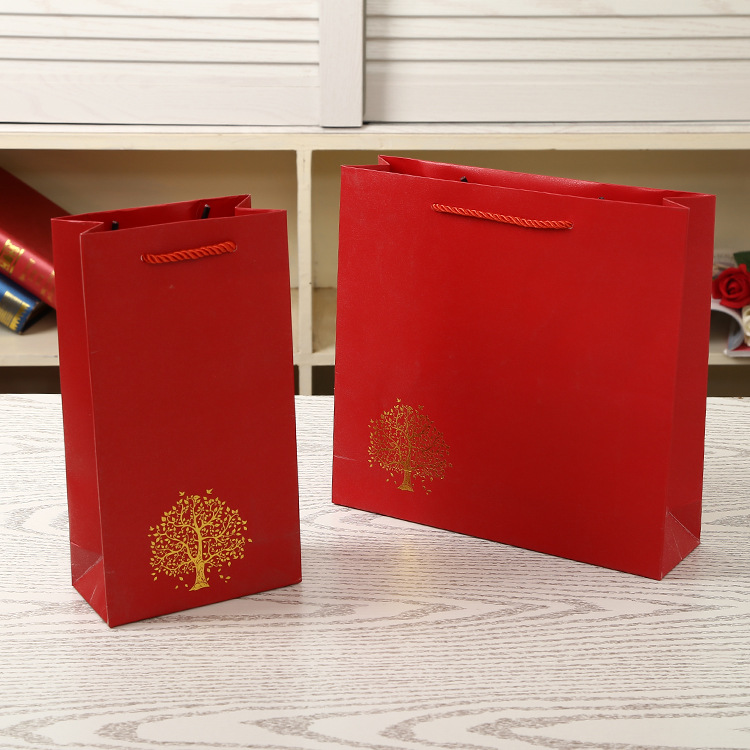 厂家供应加厚彩色婚庆喜糖手提纸袋礼品包装纸袋服装购物手提袋