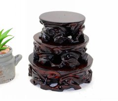 A round wooden dug-hole bonsai pot stand with a jade stone base and redwood root carving base