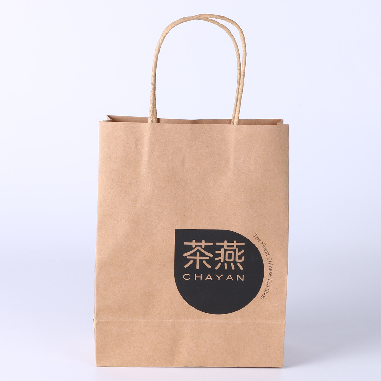 低价供应广告促销牛皮纸手提袋 定做服装购物礼品牛皮纸袋