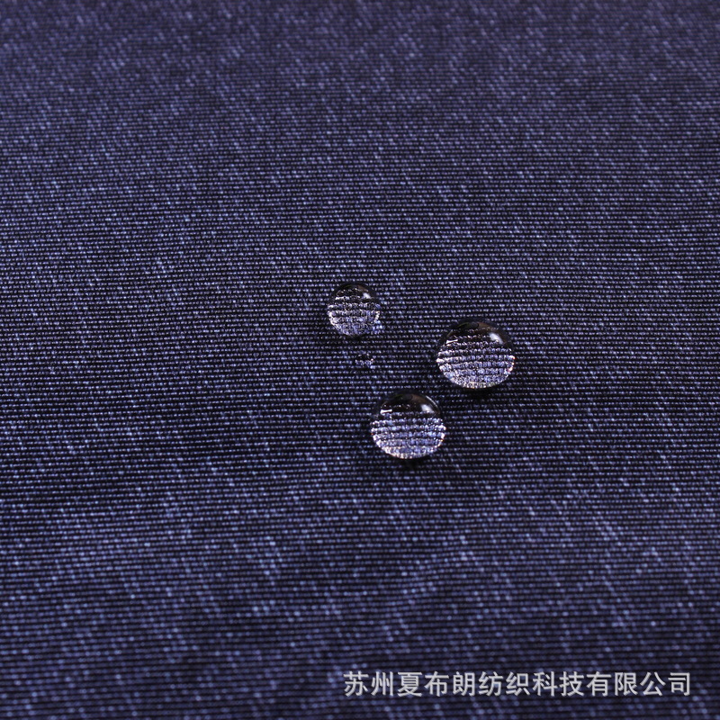 厂家供应320D涤纶塔丝隆牛仔印花透气透湿速干透气冲锋衣面料