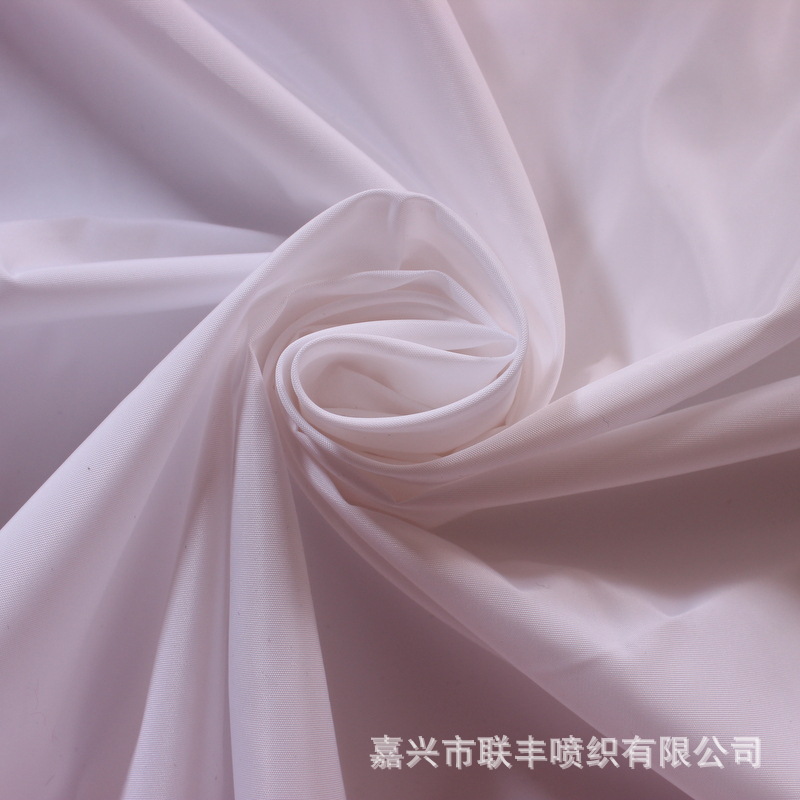 高档全涤布料记忆布 75D*75D平纹纬捻仿记忆休闲服羽绒服童装面料