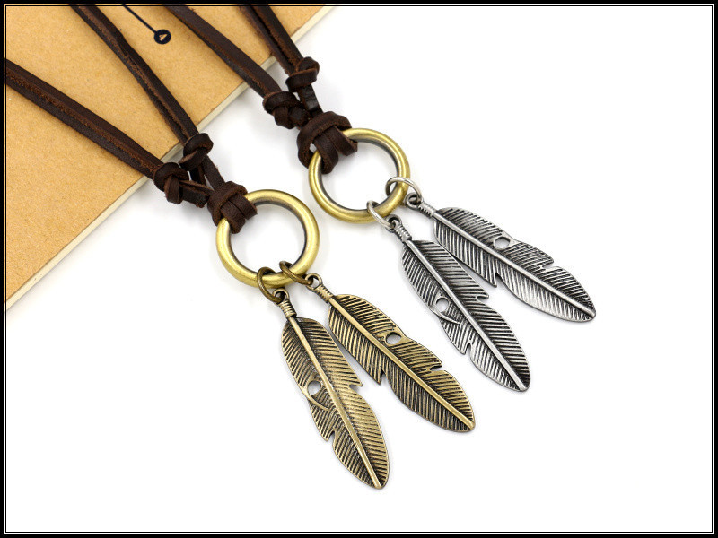 Vintage Long Sweater Chain Double Feather Pendant Ring Cowhide Necklace Alloy Leaf Leather Accessories display picture 1