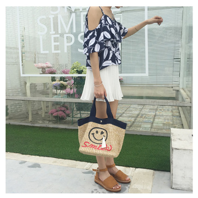 韓國官網2020新款女包可愛笑臉流蘇吊墜沙灘文藝草編包女式手提包