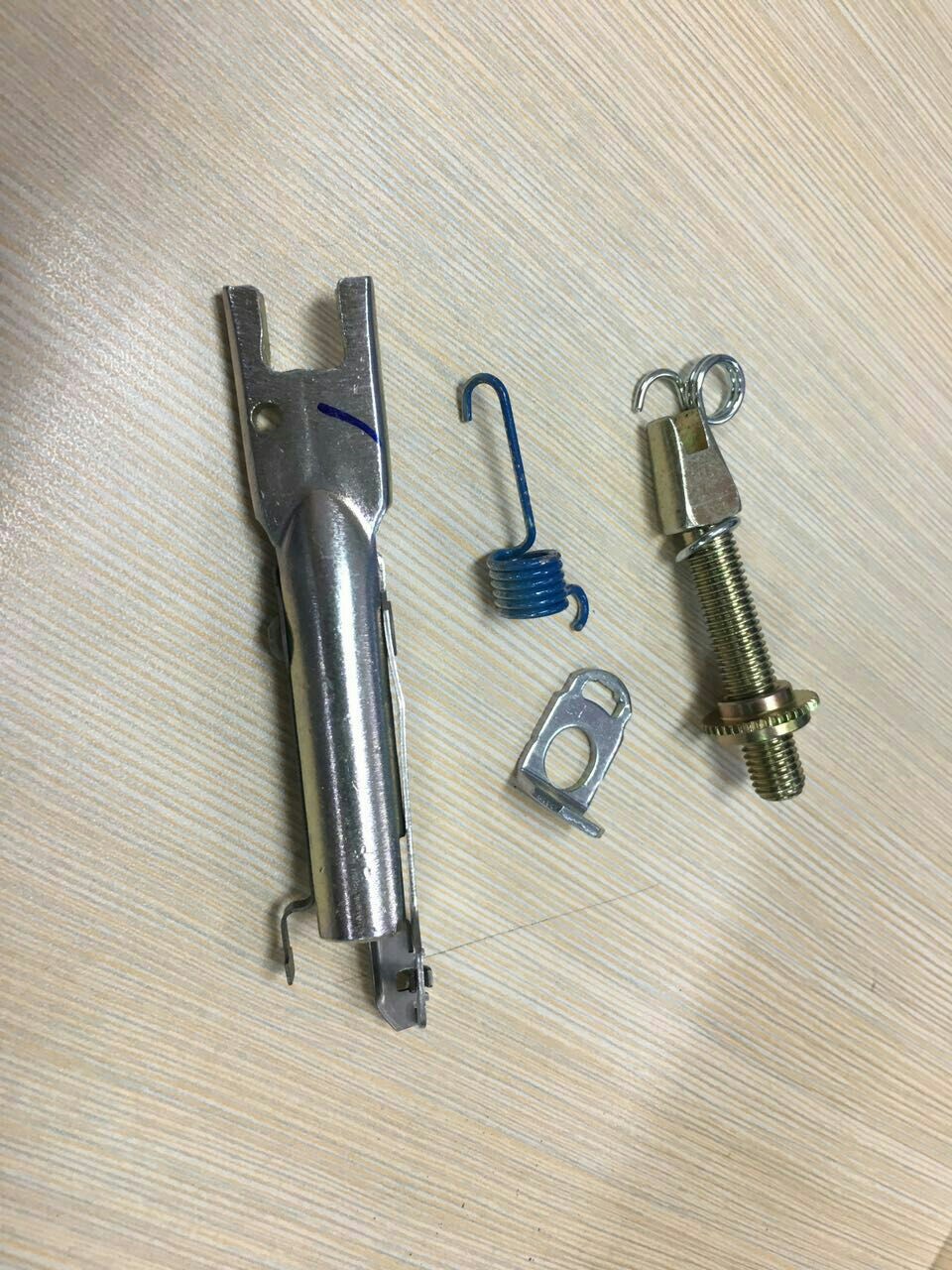 Suministro de accesorios de la motocicleta ajustador de cadena kg tirón trasero CG125YB100RS150