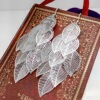 The new listing hot -selling jewelry Korean version of exquisite silver jewelry wholesale bright and beautiful hanging light tree leaves earrings