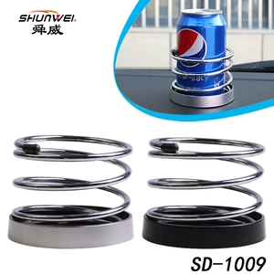 Vehicle-mounted multifunctional instrument panel beverage rack ashtray rack metal spring water cup rack car storage box