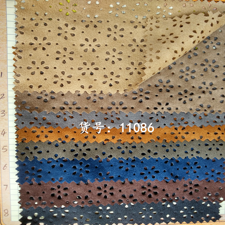 梭织双面磨毛麂皮绒仿皮绒布冲孔梅花打孔烧花镂空裙装箱包袋布料