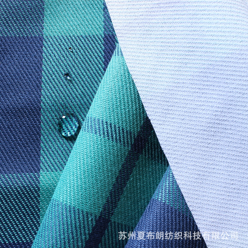 厂家供应涤棉斜纹色织格子布防水透气透湿涂层户外滑雪服面料