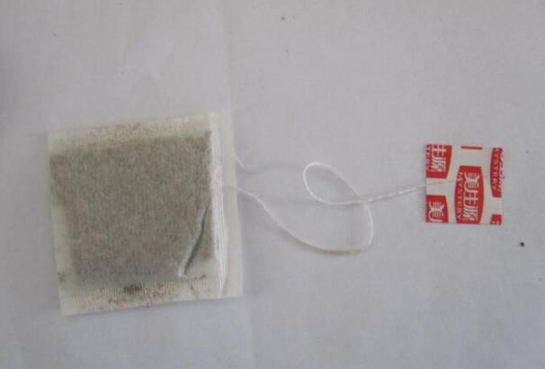 中草药袋泡茶式全自动挂线挂标包装机，钦典包装机