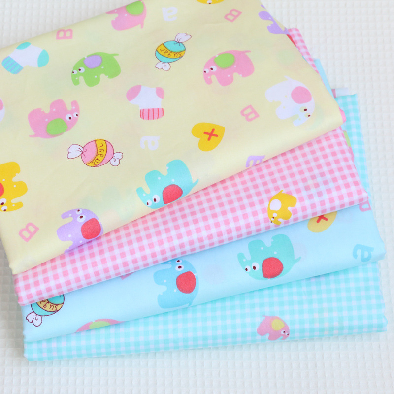 全棉斜纹布料 卡通小象宝宝纯棉印花布  幼儿园床品被套面料批发