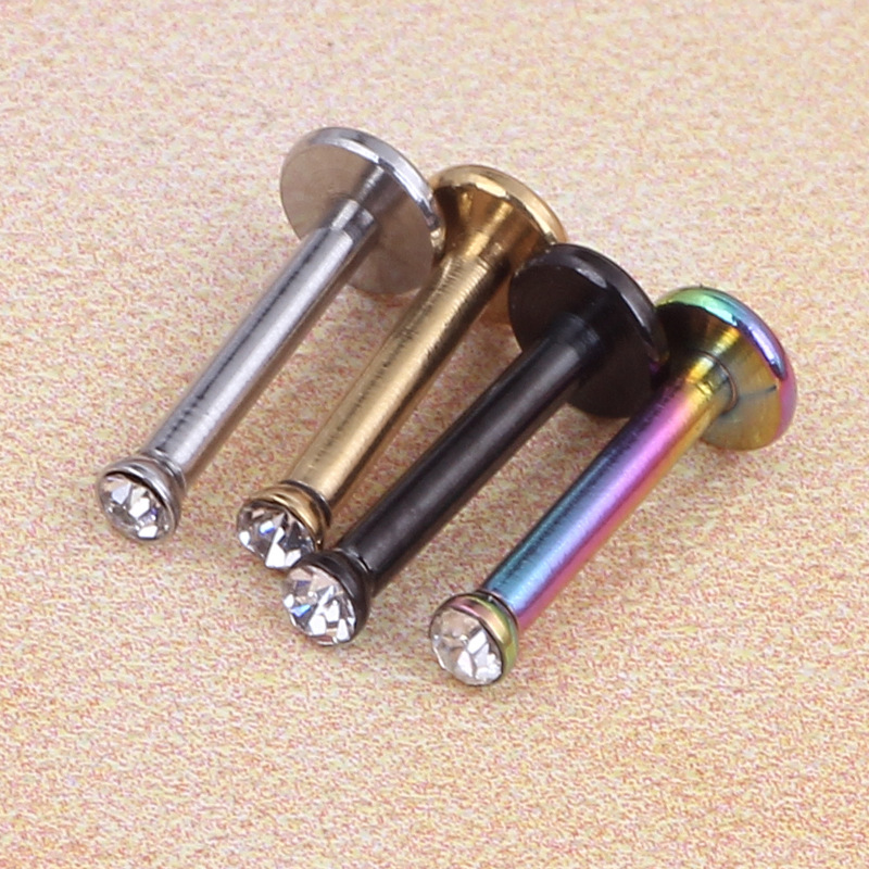 Silver pointed spike labret stud material detail