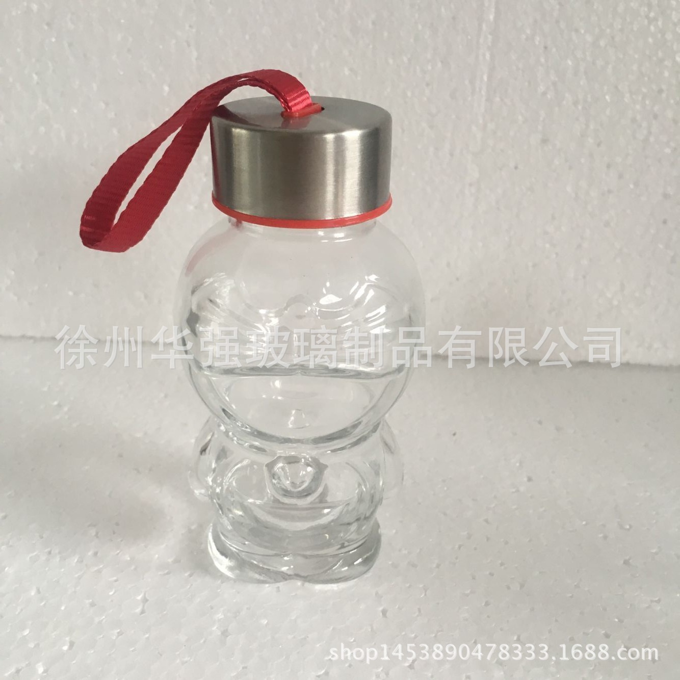 特价叮当猫布套玻璃杯 便携防漏透明水果防烫杯子带杯套