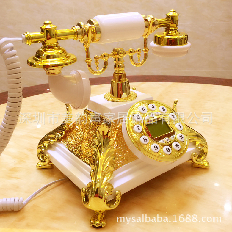 European-style gold antique telephone, hotel bedroom telephone, landline telephone for home use, retro old-fashioned telephone.