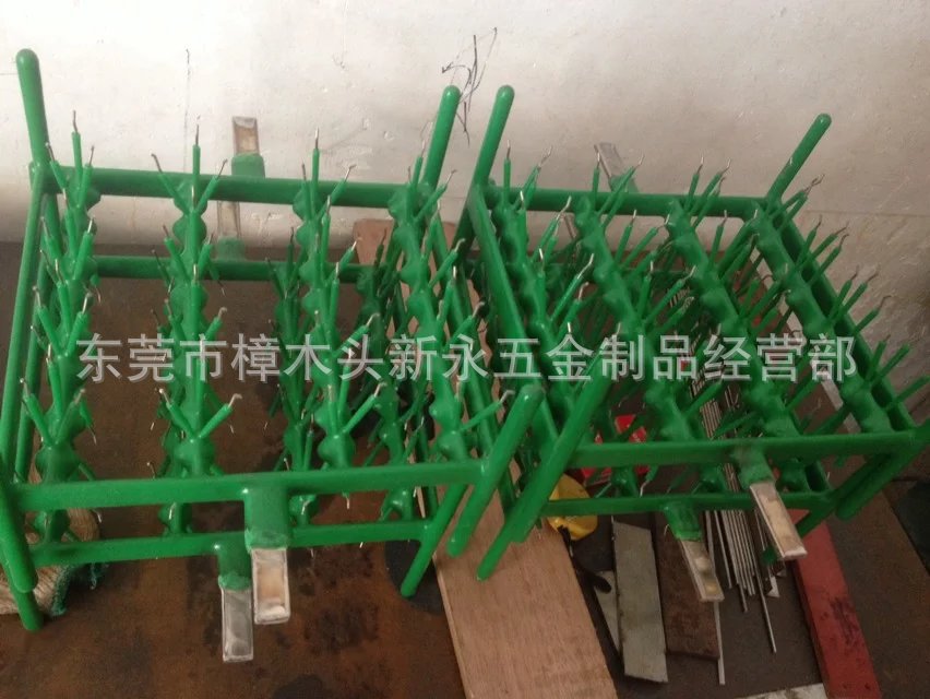 东莞新永包胶挂具、烤漆挂具、耐酸碱 耐高温 耐腐蚀包胶清洗挂具