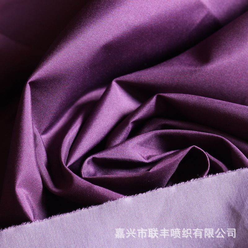 50D*50D 300T半光春亚纺平纹+紫色满底印花 运动服羽绒服棉衣面料