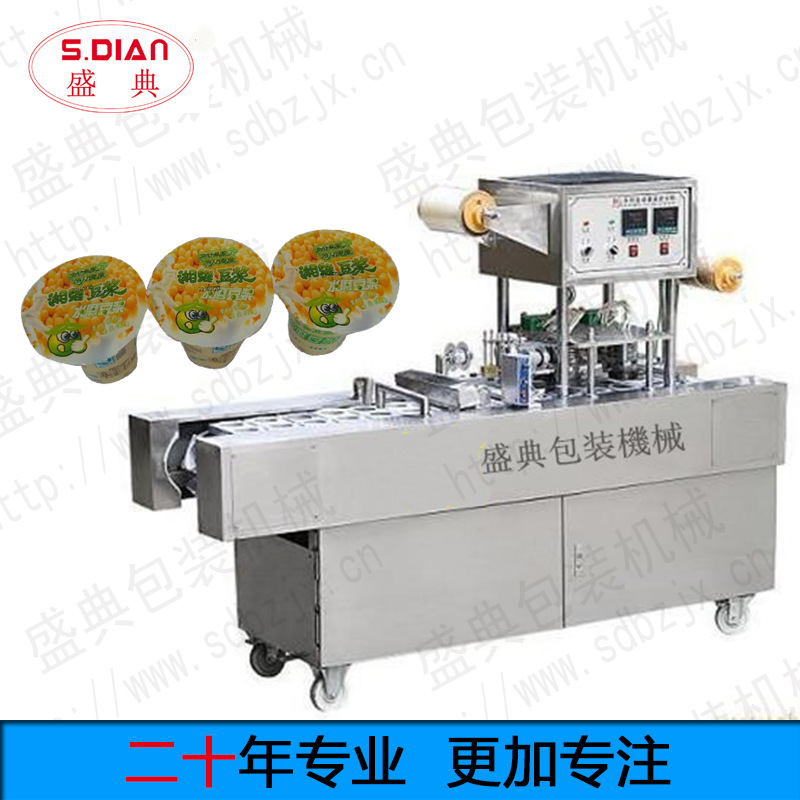 厂家专业定做 自动塑杯牛奶、豆浆、果汁充填封口机