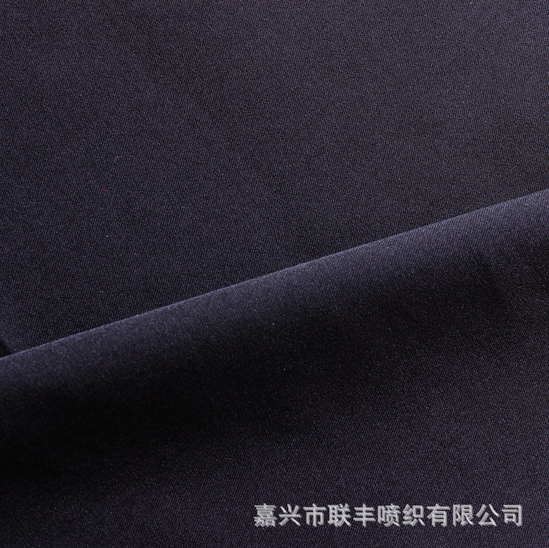 厂家供应100D斜纹四面弹单染色 冲锋衣登山服女士裙装涤纶面料