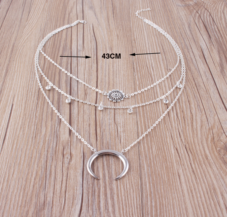 Fashion Hollow Water Drop Carved Crystal Moon Multilayer Necklace Wholesale display picture 3