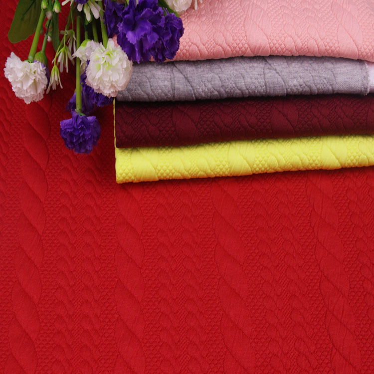 2019厂家直销秋冬新款涤纶夹棉针织提花面料童装手套劳保用料批发