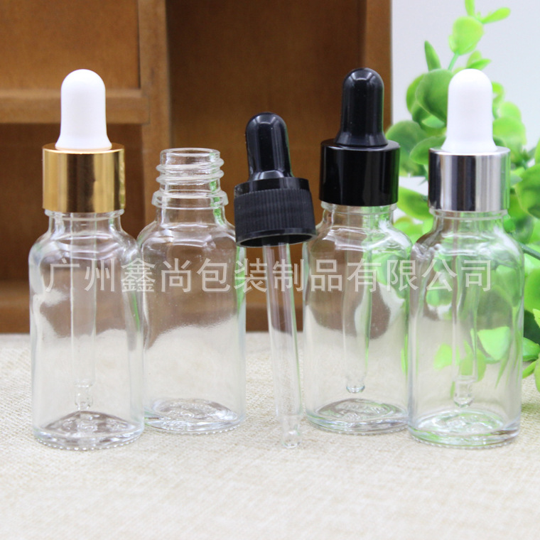 Botella de aceite esencial de vidrio transparente al por mayor botella de mezcla de cabeza de plástico 30ml cuentagotas dilución de envasado botella vacía botella cosmética