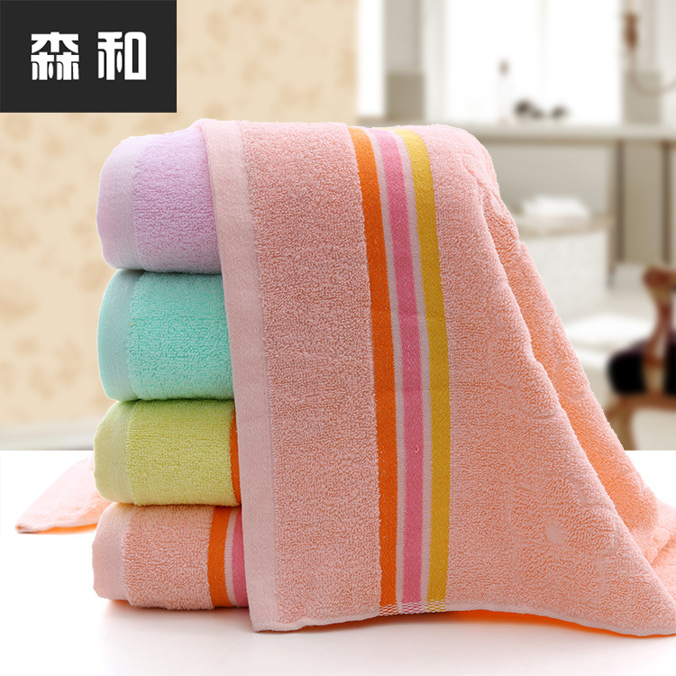 跨境专供 棉14支弱捻提梅花彩条断档浴巾 厂家特价清仓毛巾批发
