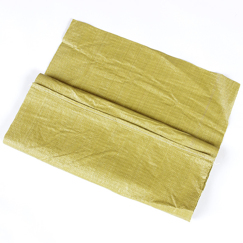 厂家批发土黄色塑料编织袋65*110cm平方米 52g物流包装袋子