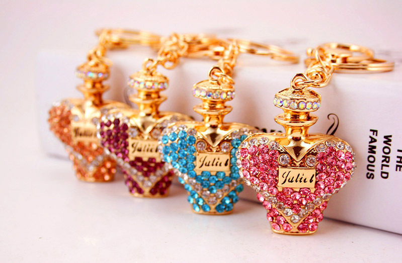 41g Weight Alloy, Metal Material Animal Pattern Unisex Gender Pink, Purple, Blue, Peach Color Crystal Diamond Perfume Bottle Women's Car Keychain 2