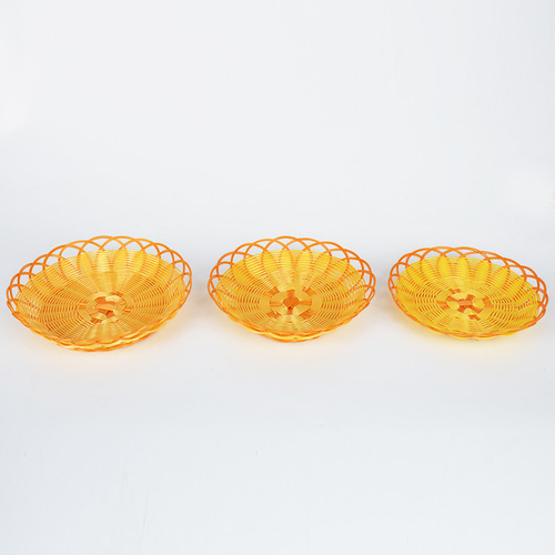 Wholesale fruit basket plastic hand-woven fruit basket imitation rattan storage basket hollow handicraft fruit plate rattan basket
