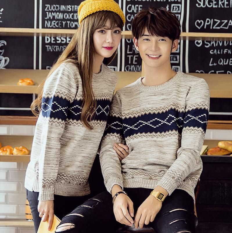 Knitted autumn insulated woolen sweater with a round collar
