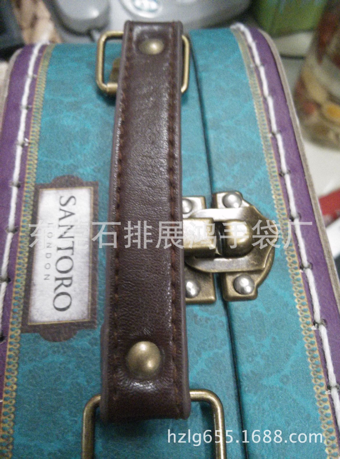 东莞手袋厂专业生产铁盒纸盒PU皮手挽/画板手提带/箱盒真皮把手