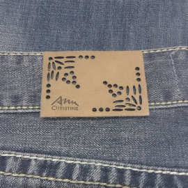 厂家供应牛仔裤牛皮皮革皮标镂空皮牌 欢迎来图样 服装pu皮标皮牌
