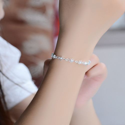 Wholesale silver chain with small hollowed-out plum blossom flowers, silver-plated handmade jewelry, sand-polished bead accessories for street stall supply