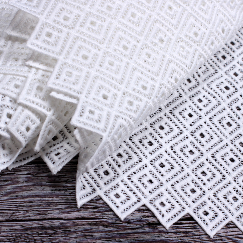 服装面料批发连衣裙礼服面料牛奶丝水溶绣花布蕾丝立体刺绣镂空