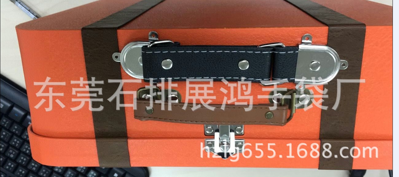 东莞手袋厂专业产纸盒木盒铁盒收音机音响PU皮手挽/真皮手提带