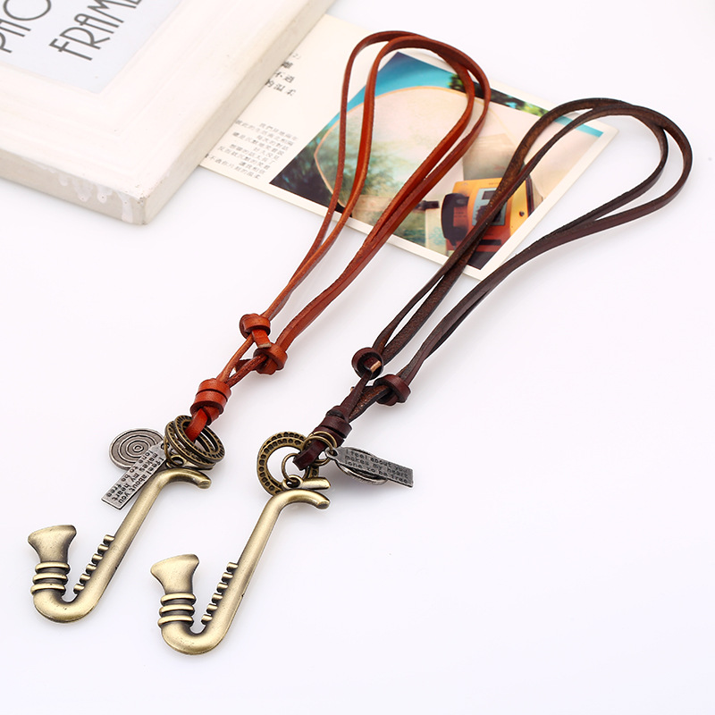 Vintage cowhide rope alloy musical instrument cowhide necklace sweater chain long money chain fashio
