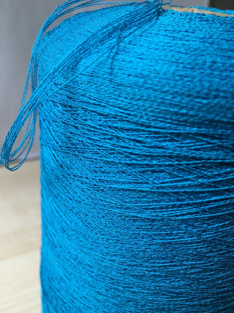 24支 曲珠纱  65%粘胶35%尼龙  色筒纱 单曲