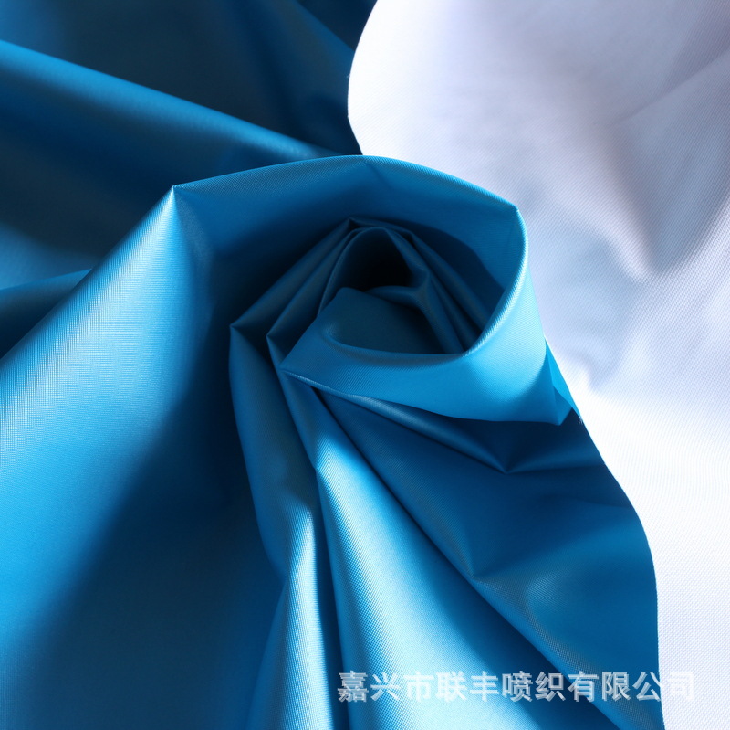 190T斜纹春亚纺+离型纸转移涂层（珠光浅蓝） 仿皮衣皮裤童装夹克