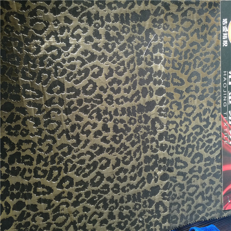 全涤金丝豹纹图案色织梭织提花布适用于服装装饰沙发布鞋子布